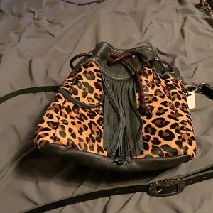Leopard hair on hide bag